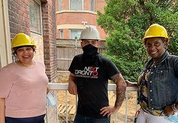 Jyoti Singh & Maureen Caines-Comrie at the construction site for the new shelter